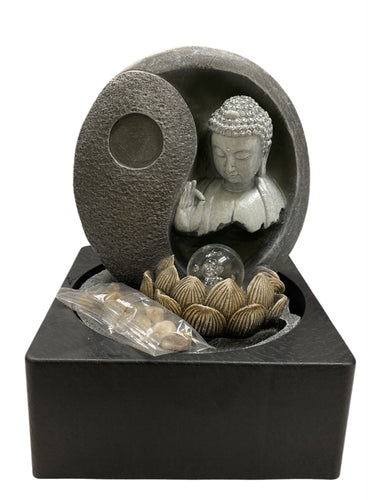 Buddha  fountain within the Ying Yang and lotus with crystal ball